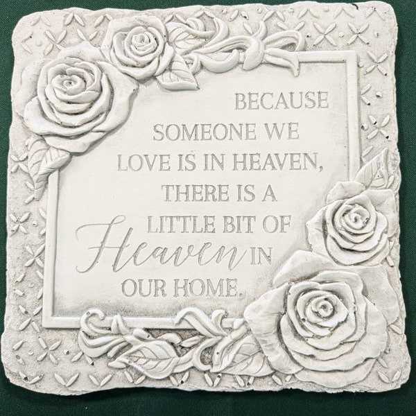 Decorative memorial plaque with raised roses and a sympathy quote