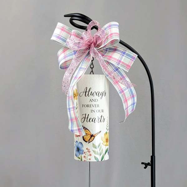 Decorative hanging memorial sign with a plaid bow and butterfly charm