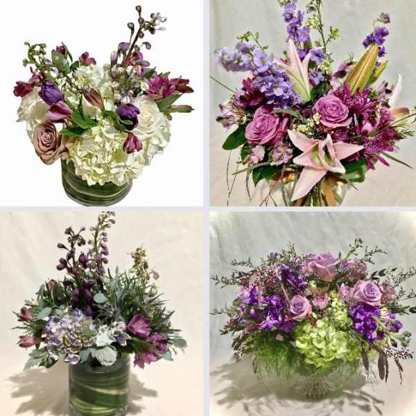 Four purple and white mixed flower arrangements in clear glass vases with roses, hydrangeas and accent blooms.
