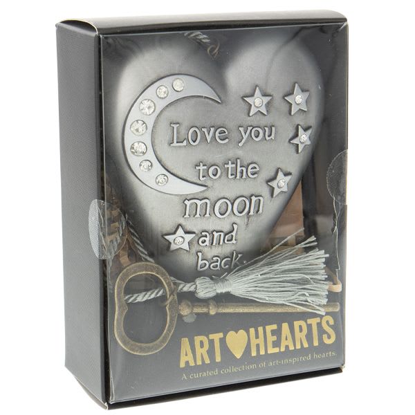 Decorative heart-shaped gift box with moon and star accents and the words "Love you to the moon and back"