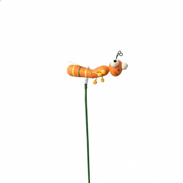 Orange decorative insect pick on a long green stem