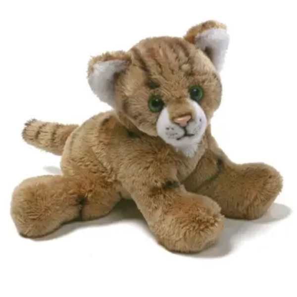 Plush tiger cub toy sitting on a white background
