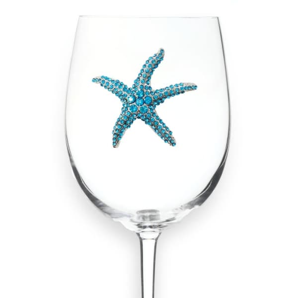Clear wine glass with a blue jeweled starfish design