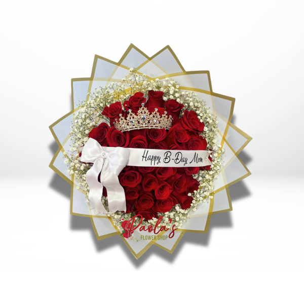 Heart-shaped bouquet of red roses with a crown and white ribbon