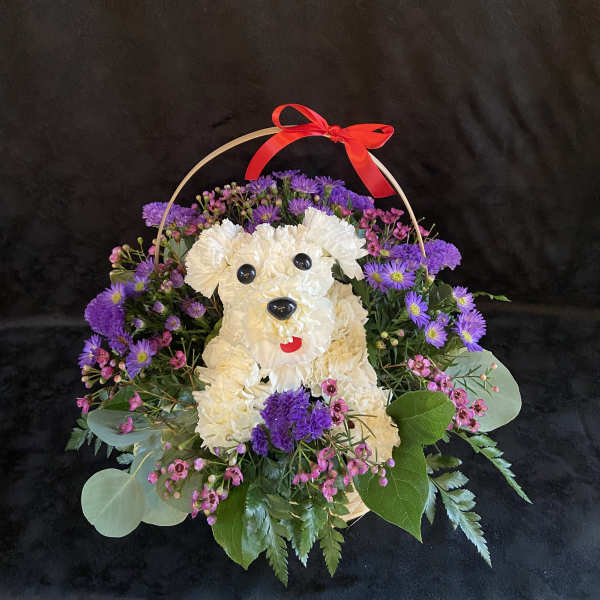 Flower basket shaped like a white dog with purple and pink blooms