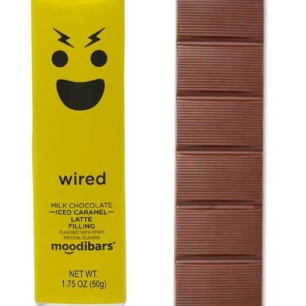 Yellow chocolate bar wrapper beside a segmented milk chocolate bar