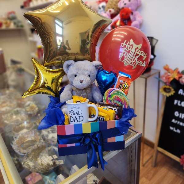 Gift basket with balloons, teddy bear, and candy for Dad