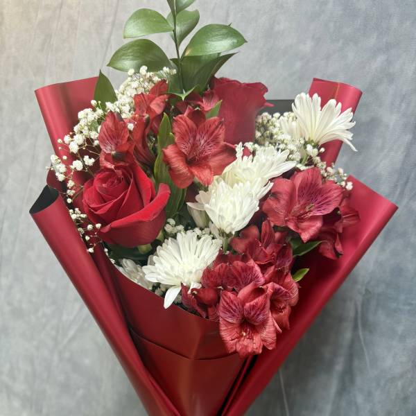 Red and white mixed bouquet with roses, daisies, and alstroemeria
