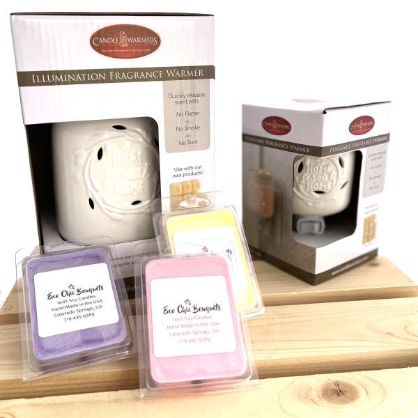 Packaged candle warmers and wax melts on a wooden surface