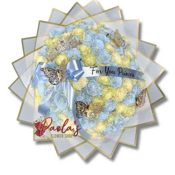 Bouquet of blue and yellow roses with a ribbon and butterfly decorations