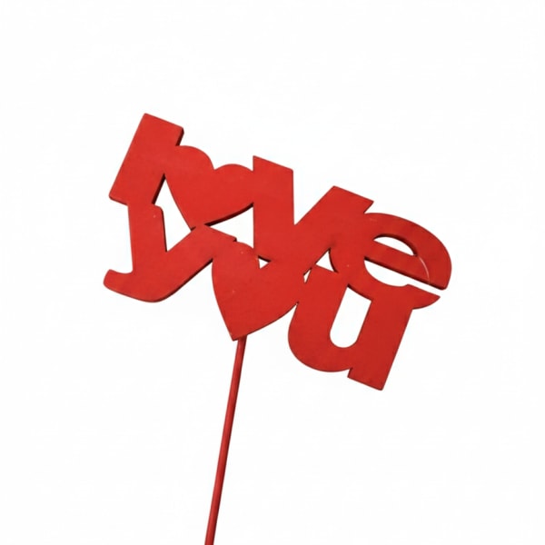 Red "love" pick on a stick against a white background