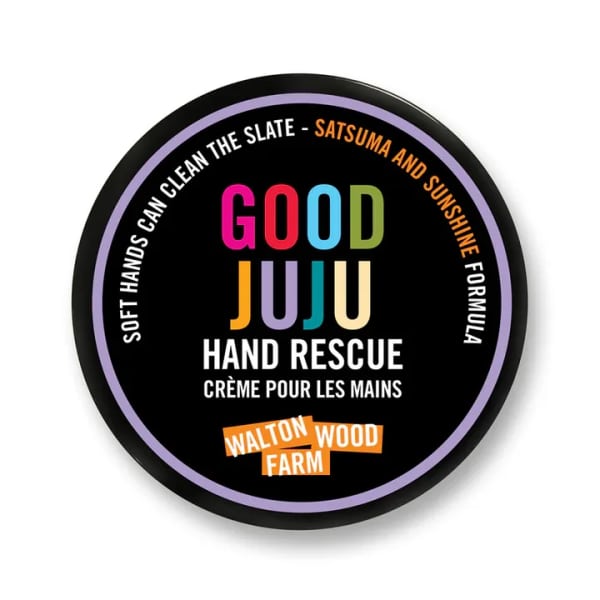 Round tin of Good Juju hand rescue cream with colorful label