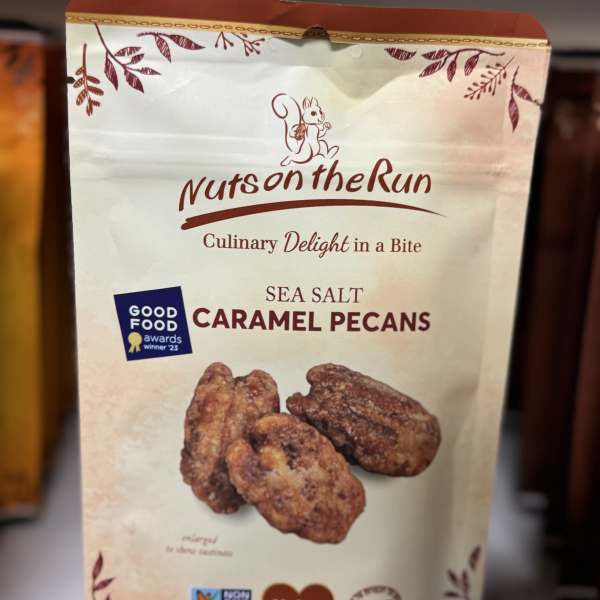 Bag of sea salt caramel pecans with a nut image on the front