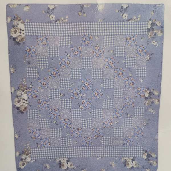 Blue and White Diamond Pattern Quilt