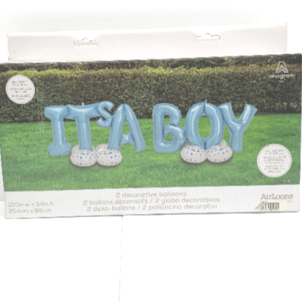 Blue 'It’s a Boy' letter balloons on white dotted bases on a lawn backdrop