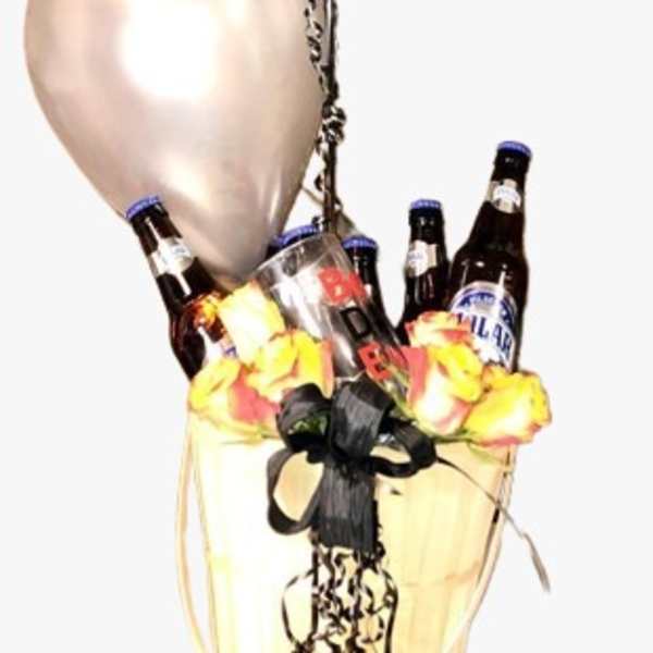 Balloon bouquet with champagne bottles in a gold bucket