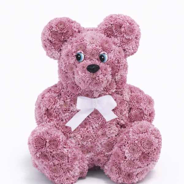 Pink flower teddy bear with a white bow