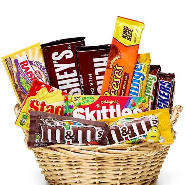Basket filled with assorted candy bars and chocolate packs