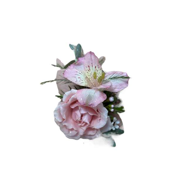 Small pink floral corsage with a rose and lily