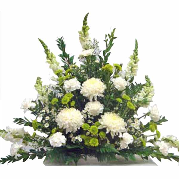 White and green sympathy floral spray with chrysanthemums and snapdragons