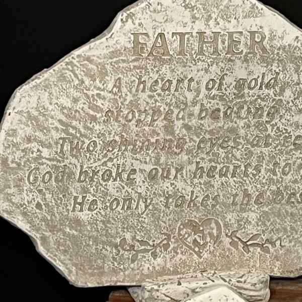 Decorative stone plaque with an engraved Father quote