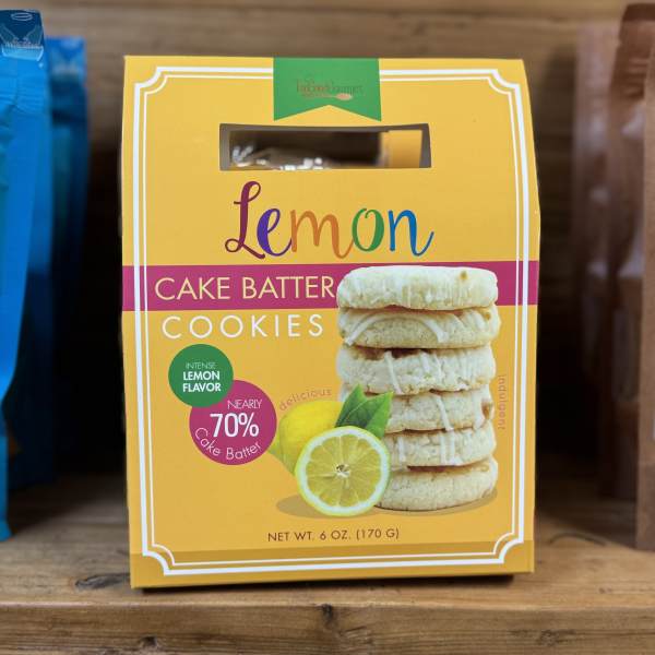 Box of lemon cake batter cookies on a wooden shelf