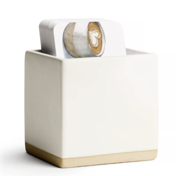 Ceramic square vase holding a card with a coffee cup illustration