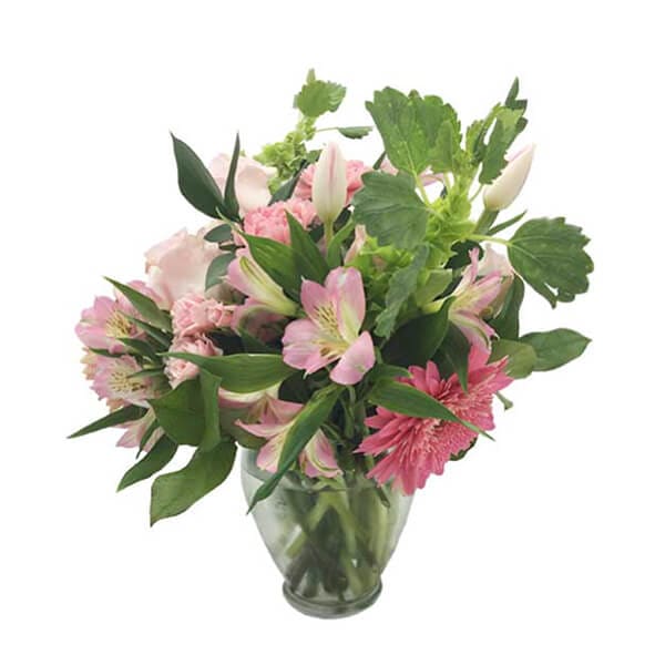 Pink mixed bouquet in a clear glass vase