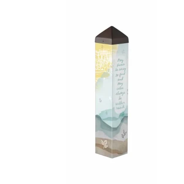 Decorative memorial keepsake with a printed quote and pastel landscape design