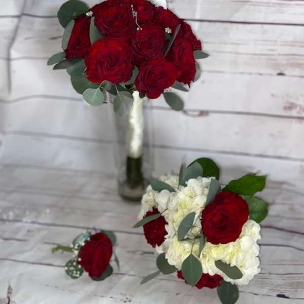 Red rose bouquet with eucalyptus and white hydrangeas
