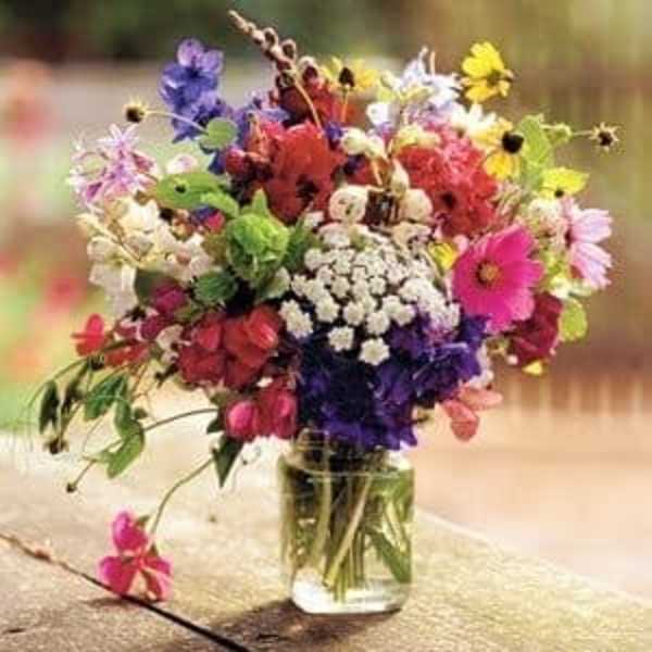 Colorful mixed bouquet in a clear glass vase