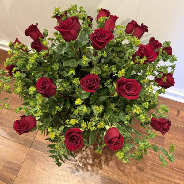 Bouquet of red roses with green filler flowers