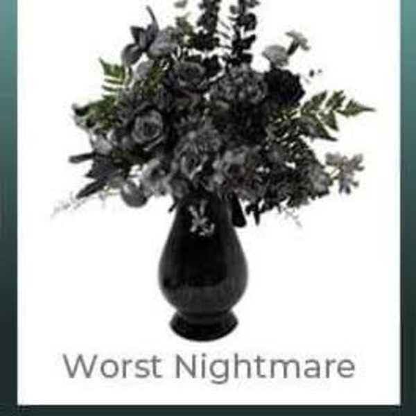Dark floral arrangement in a black vase with the words "Worst Nightmare" below