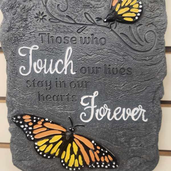 Decorative wall plaque with butterflies and a quote