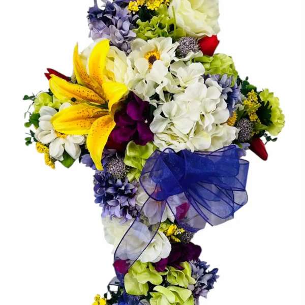 Colorful bouquet with lilies, hydrangeas, and a blue ribbon