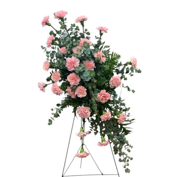 Pink carnation standing spray on a metal easel