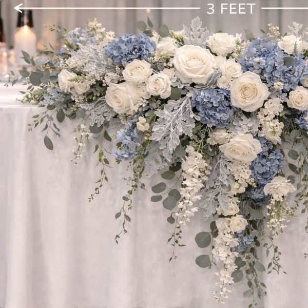 White and blue floral garland draped over a table