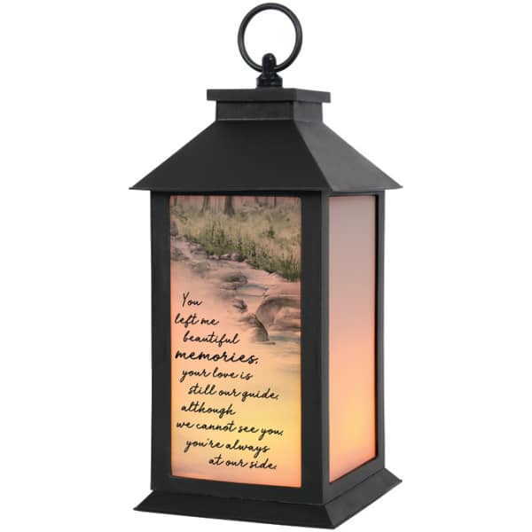Black memorial lantern with a printed sympathy message and sunset scene