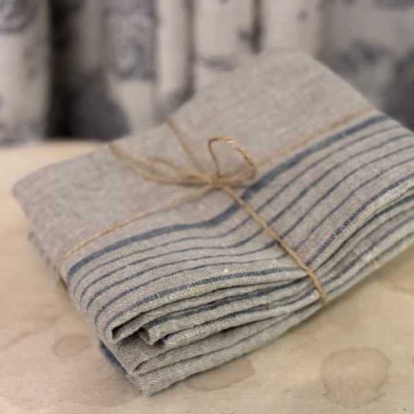 Folded striped cloth tied with twine on a table
