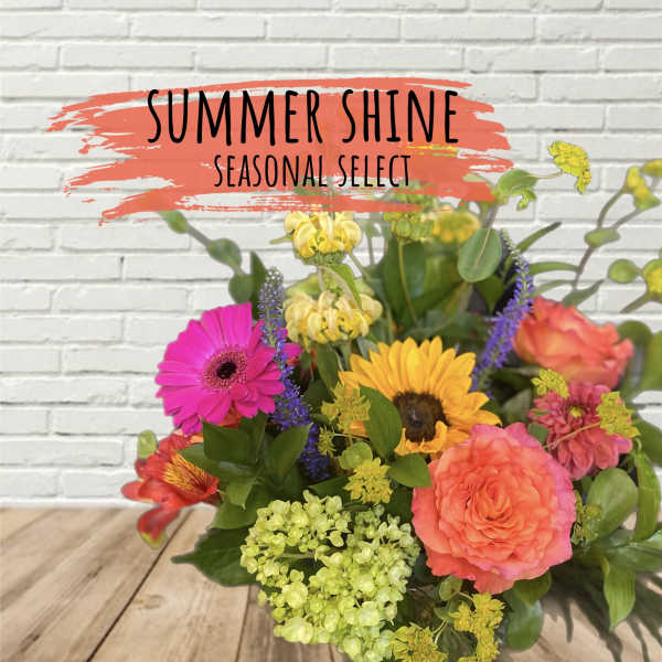 Bright mixed bouquet with gerbera daisies, roses, and hydrangea