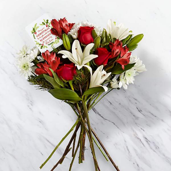 Bouquet of red roses, white lilies, and white daisies