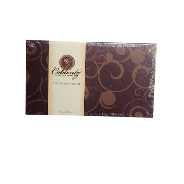 Box of assorted chocolates in dark brown packaging
