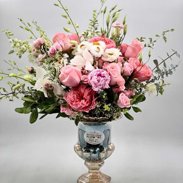 Pink and white mixed bouquet in a glass vase
