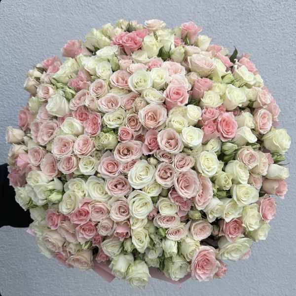 Large bouquet of pale pink and white roses