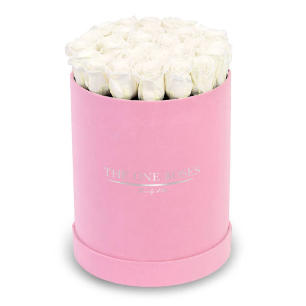 White roses in a pink round box