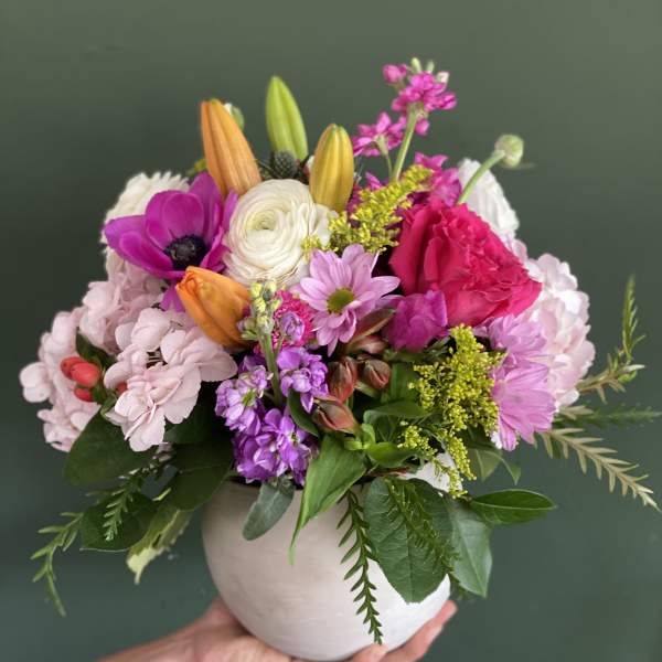 Mixed pink and white bouquet in a white vase