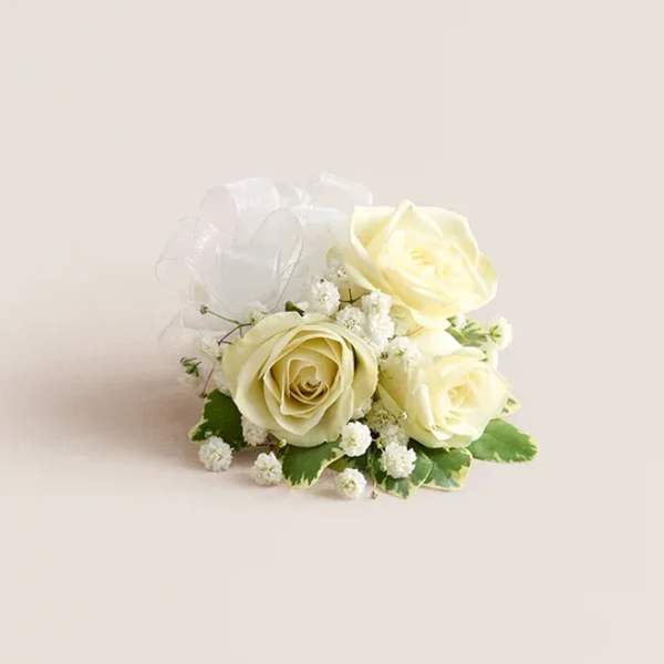 Cream rose bouquet with white filler flowers and sheer ribbon