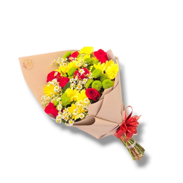 Bouquet of red roses, yellow blooms, and green button mums wrapped in beige paper