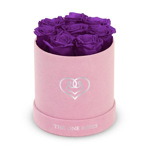 Purple roses in a pink round box