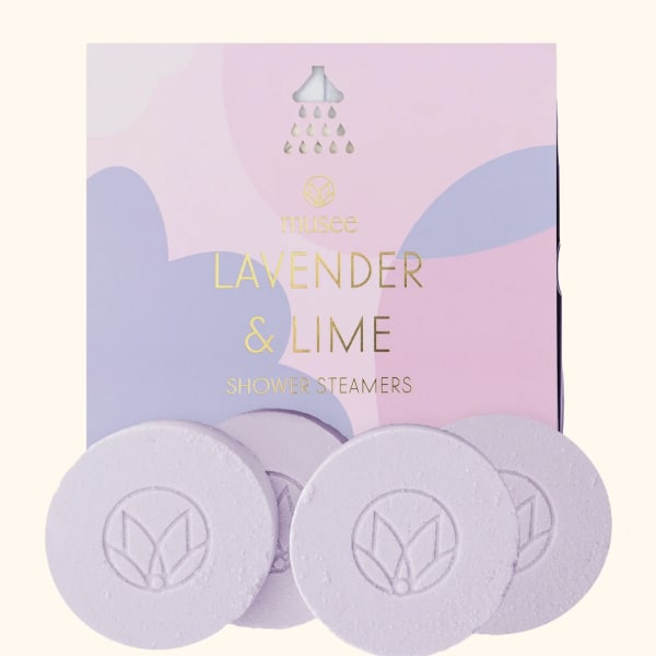Box of lavender and lime shower steamers with round tablets in front